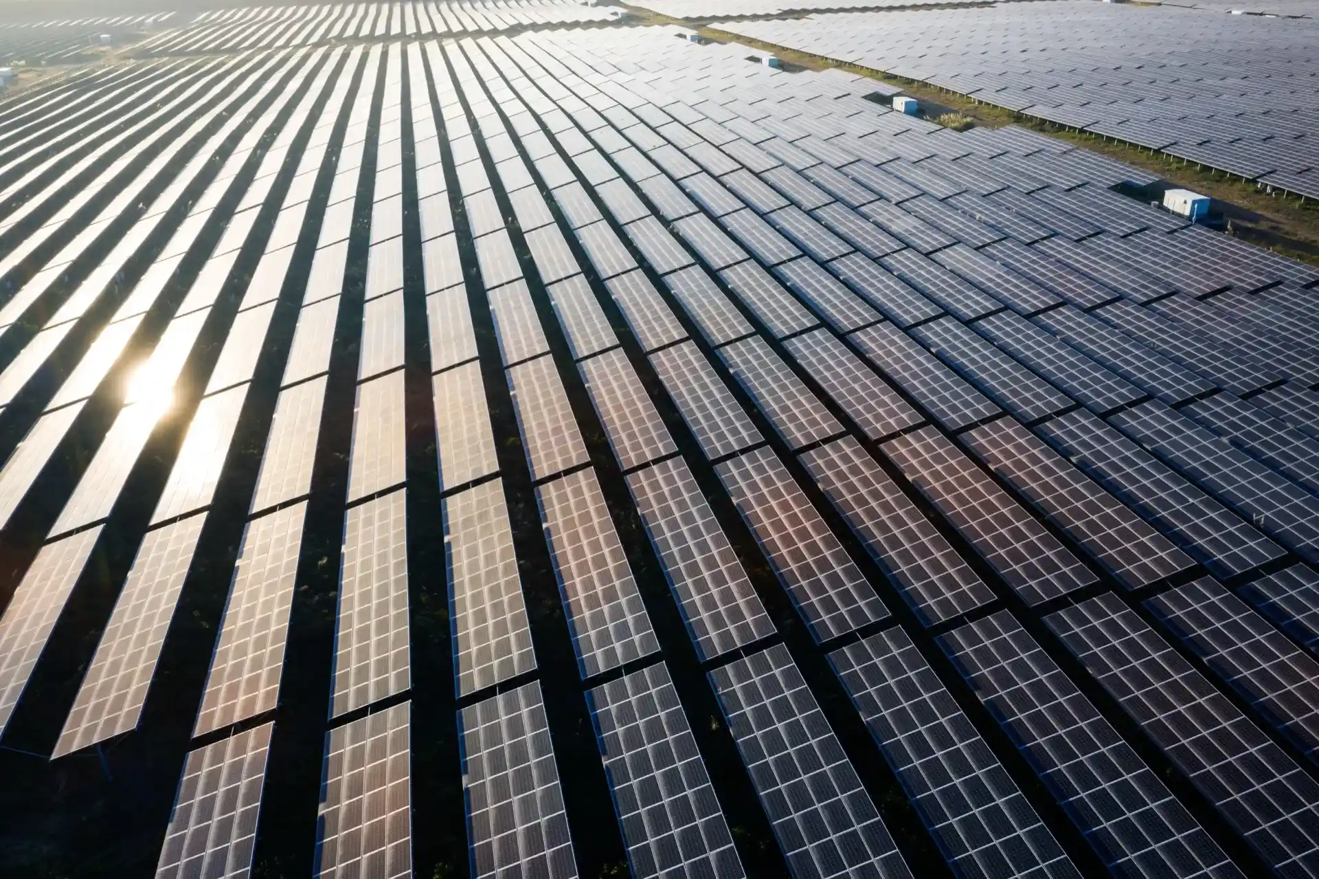 Aerial view of solar farm at golden hour
